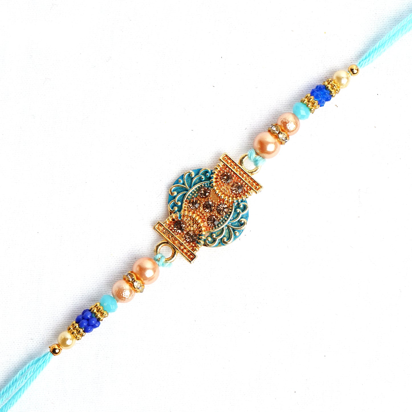 Beautiful Designer Blue Pearl Rakhi for Brother Comes with Complimentary Roli Chawal