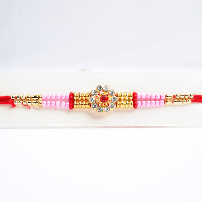 Designer Pink Flower Stones Rakhi for Brother Comes with Complimentary Roli Chawal