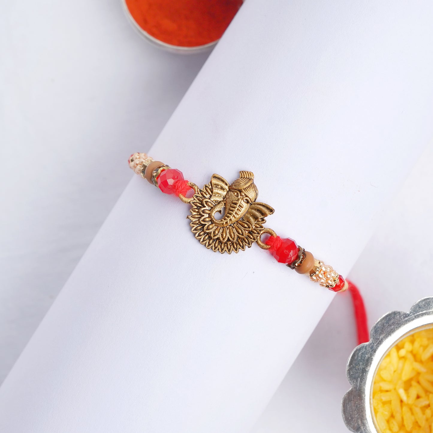 Traditional Ganesha Rakhi for Brother Complimentary Roli Chawal