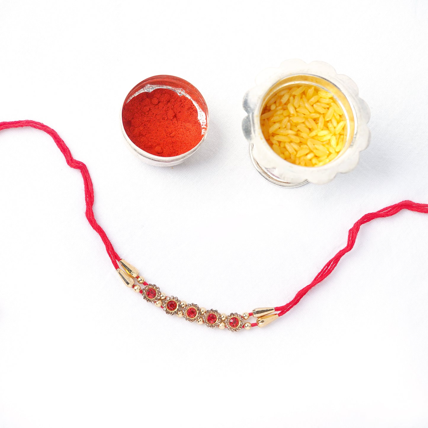 Designer Red Stone Rakhi for Brother Comes with Complimentary Roli Chawal